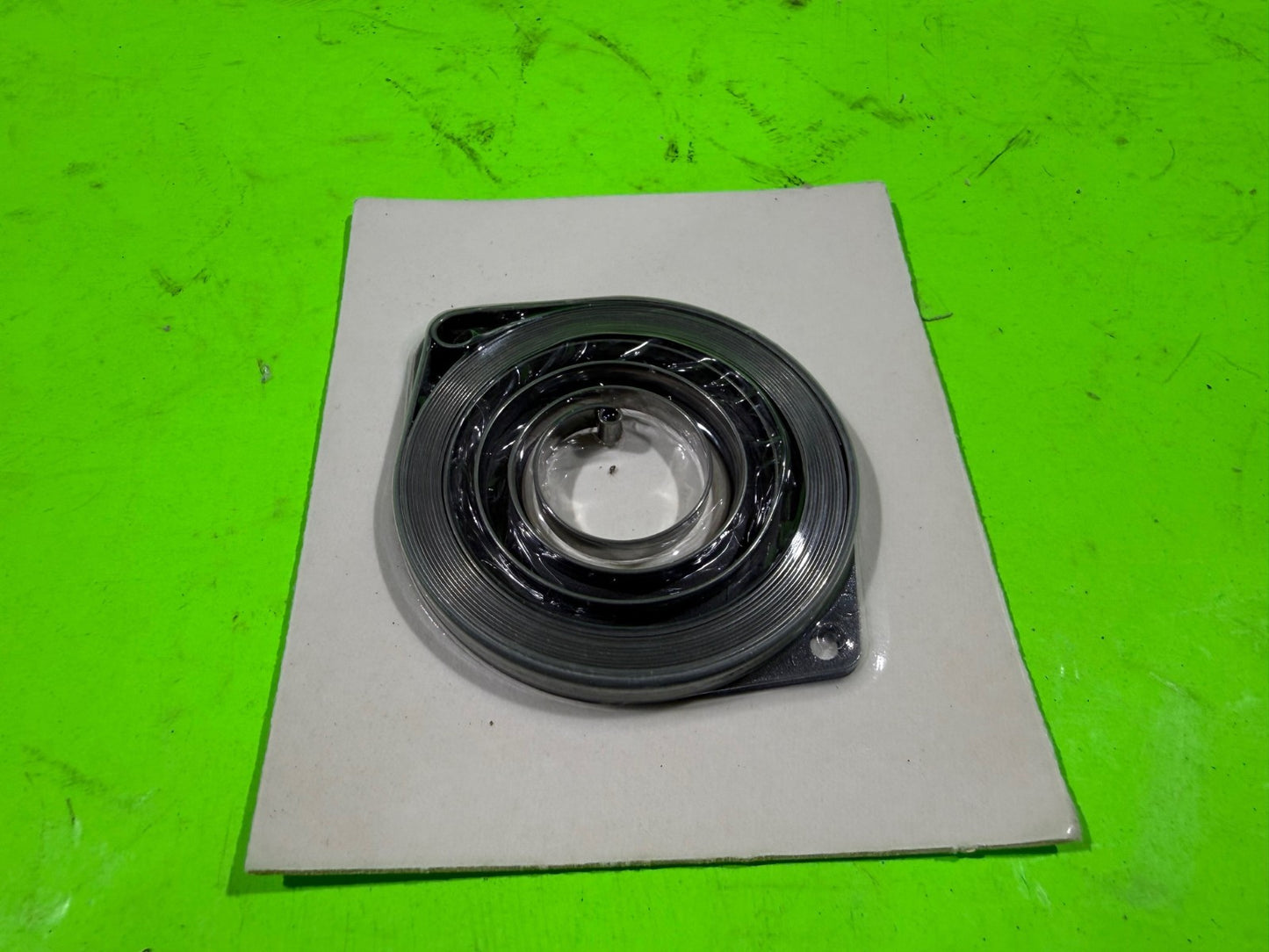 New Genuine OEM Husqvarna 502200601 Recoil Spring Jonsered0