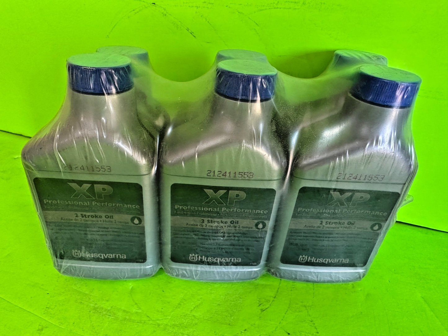 Husqvarna XP 2-Cycle Oil – 6-Pack OEM 6.4 oz Bottles (Part #212411553)1