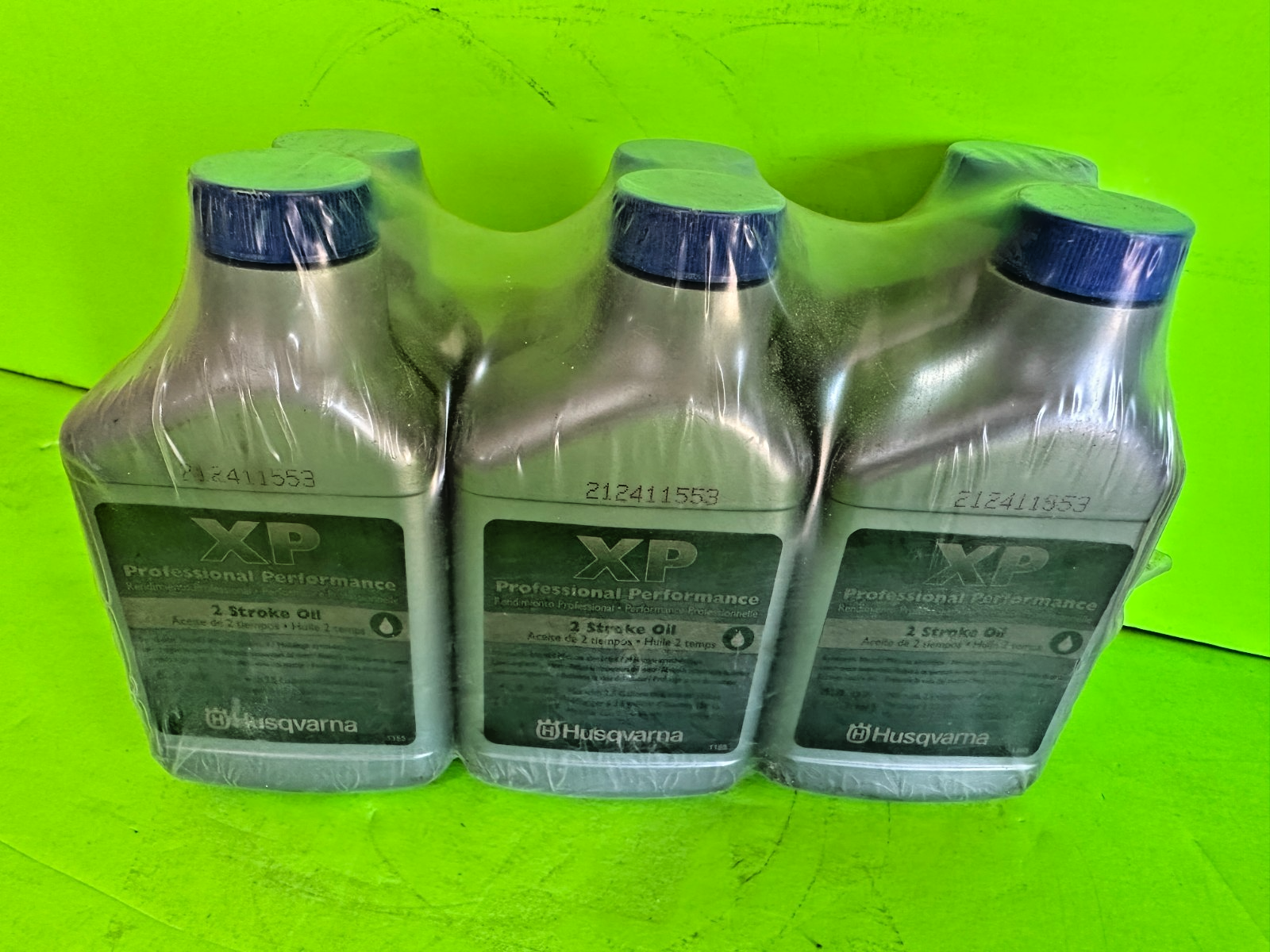 Husqvarna XP 2-Cycle Oil – 6-Pack OEM 6.4 oz Bottles (Part #212411553)1